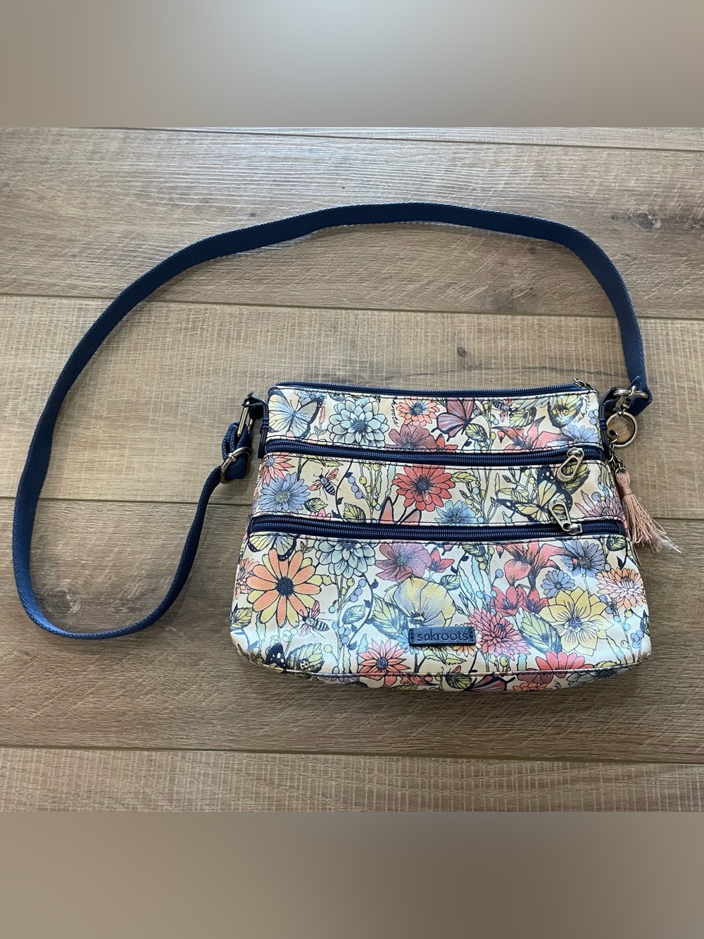 Sakroots Floral Crossbody Bag in Navy and Multicolor Print